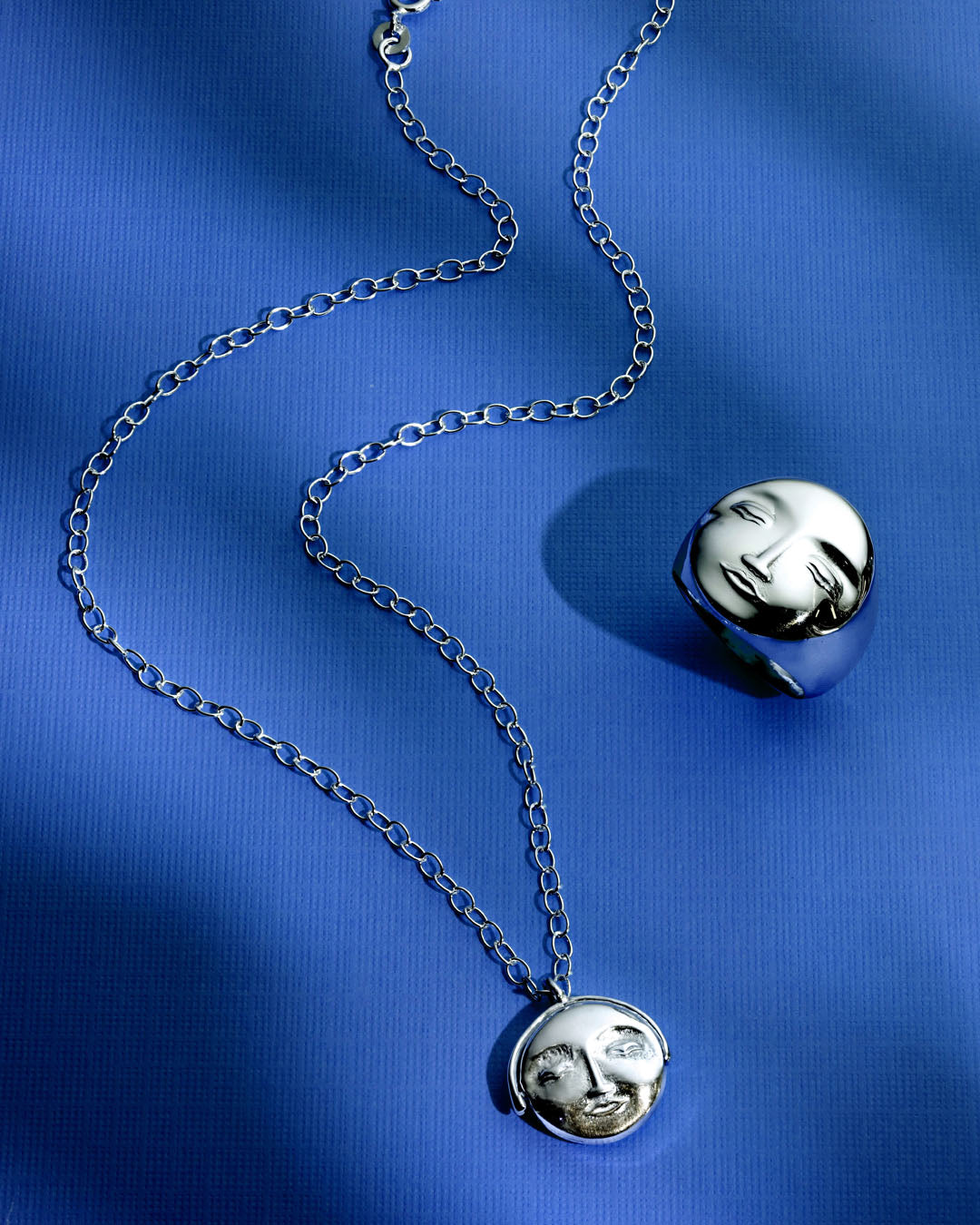 Fidget Sonne und Mond Gesicht Halskette