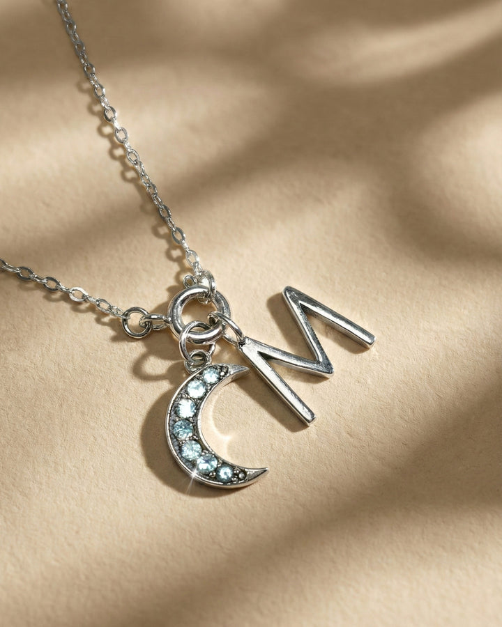 Blue Topaz Moon Charm Sterling Silver