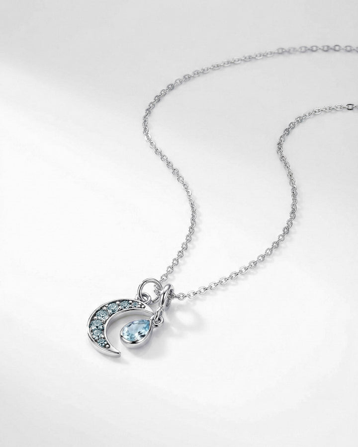 Blue Topaz Moon Charm Sterling Silver