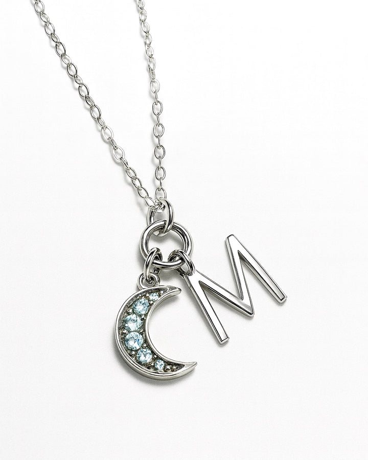 Blue Topaz Moon Charm Sterling Silver