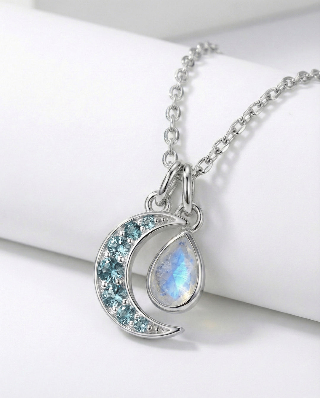 Blue Topaz Moon Charm Sterling Silver