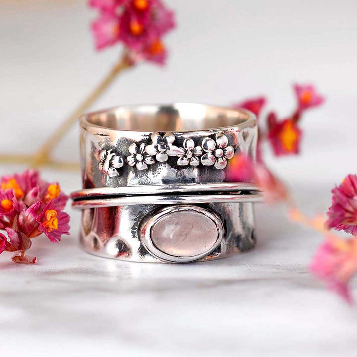 Rosenquarz Blumen und Schmetterling Spinner Ring