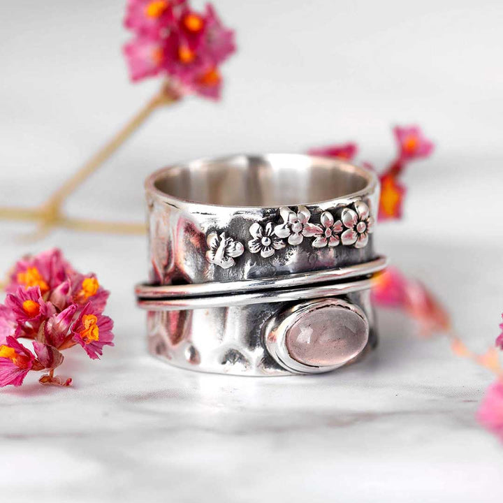 Rosenquarz Blumen und Schmetterling Spinner Ring