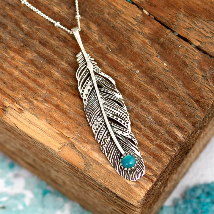 Long silver feather necklace shop